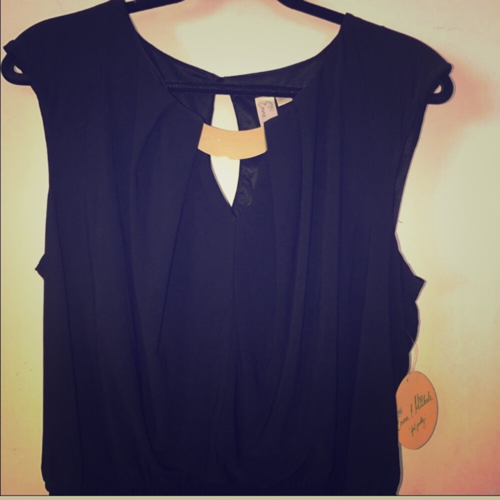 Black pants suit with gold accent